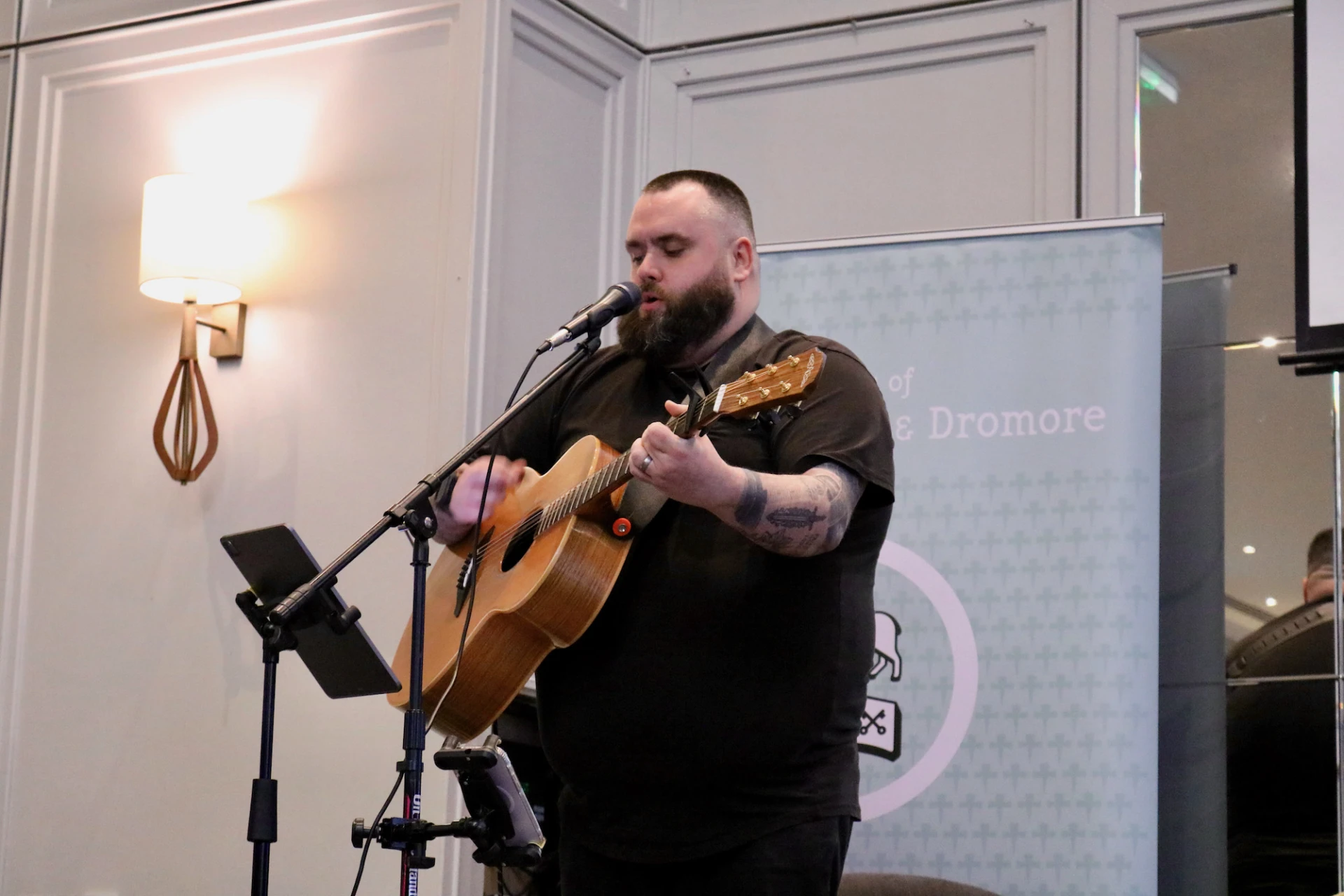 Billy Fyffe leads on guitar