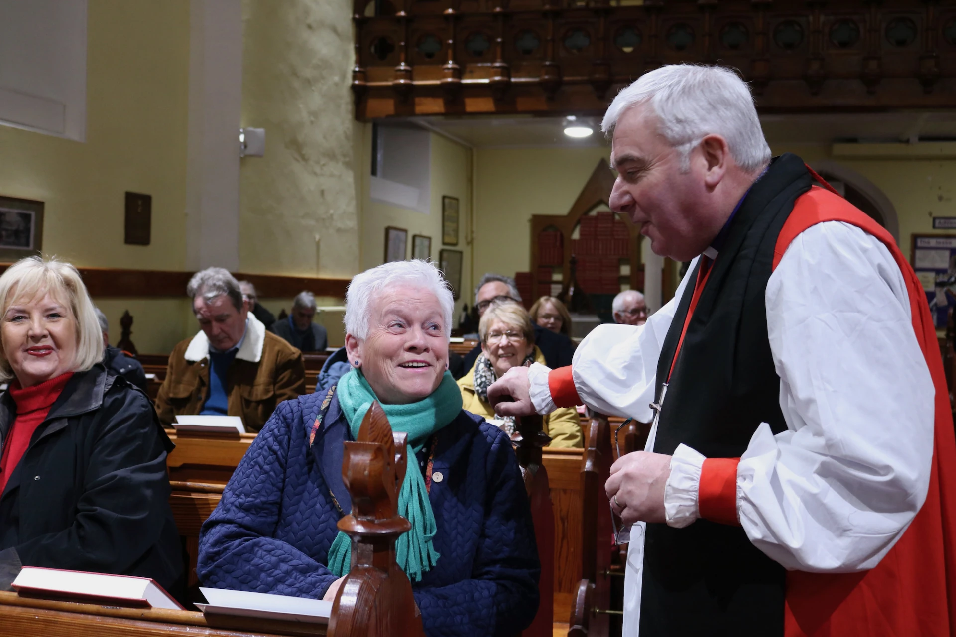 Bishop David chats with the congregation