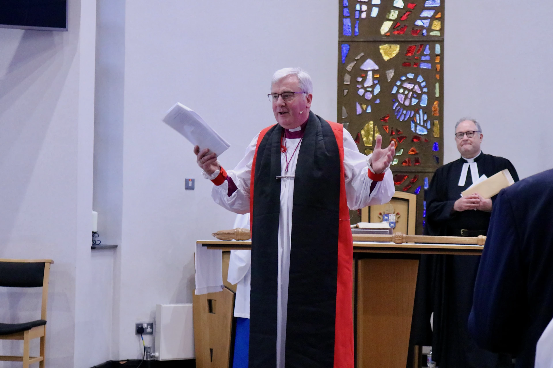 Bishop David opens the service