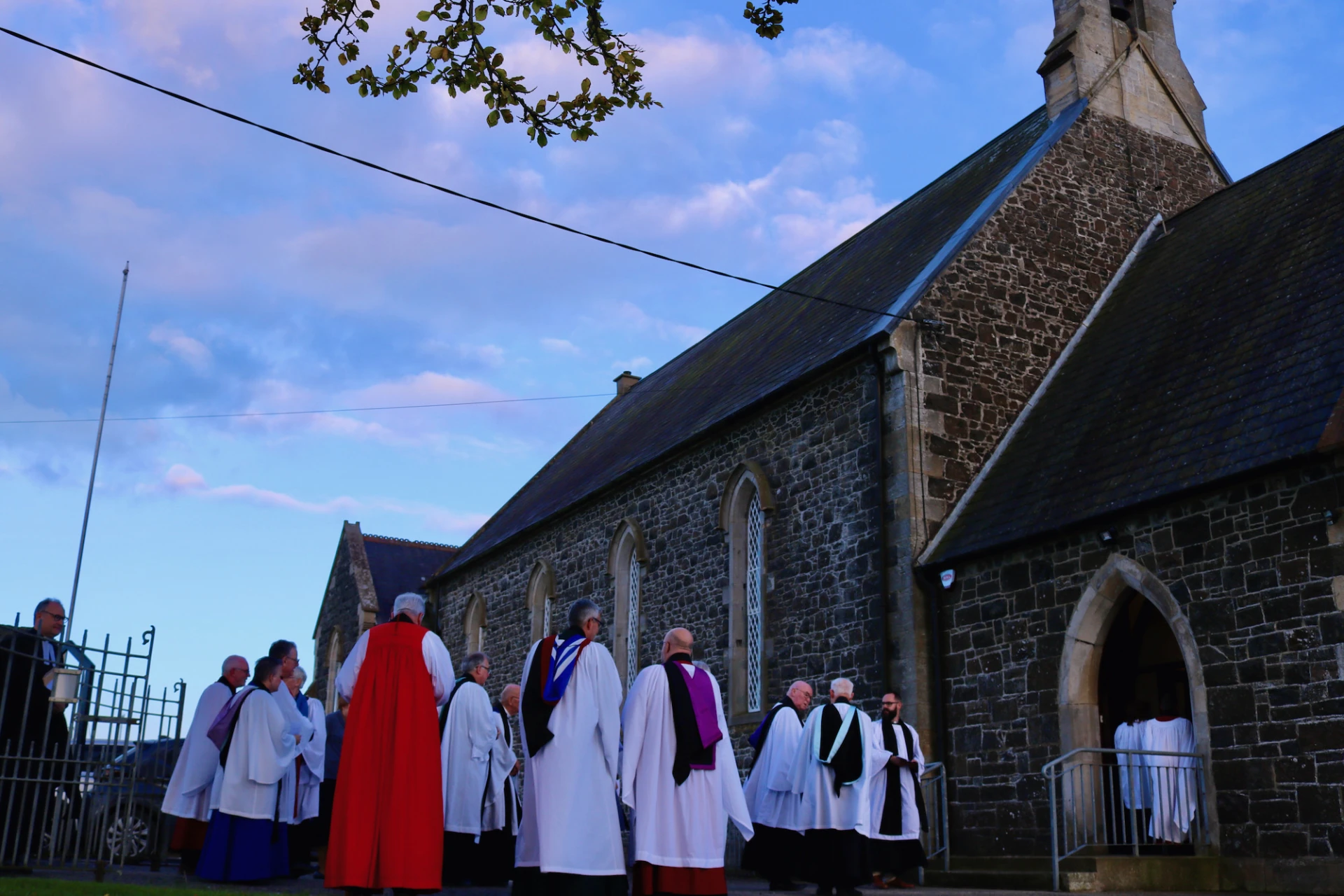 Bishop David and his clergy prepare to process