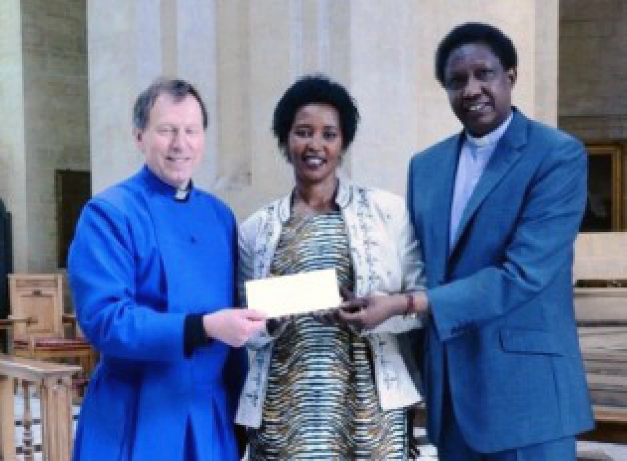 Cheques presented to charities at Belfast Cathedral