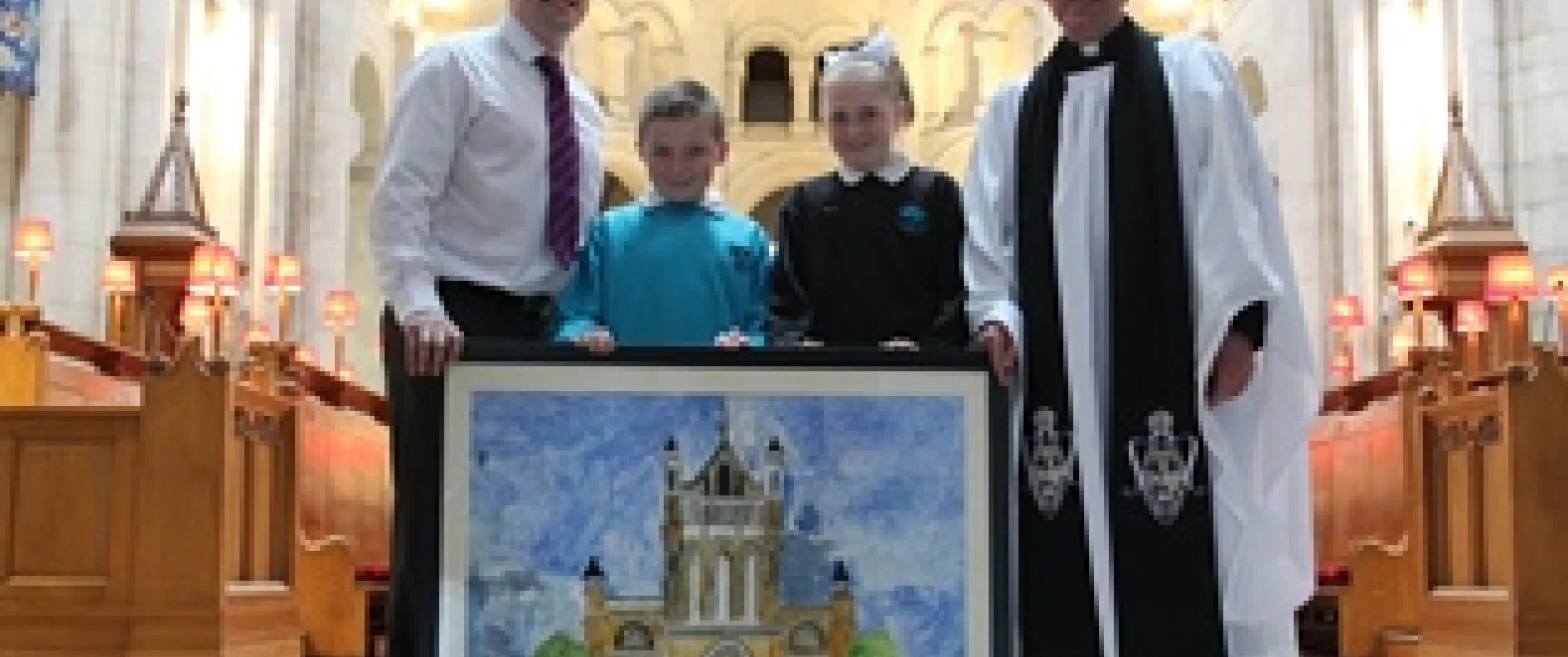 School gifts painting to St Anne’s Cathedral