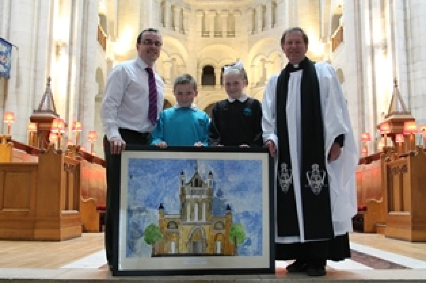 School gifts painting to St Anne’s Cathedral