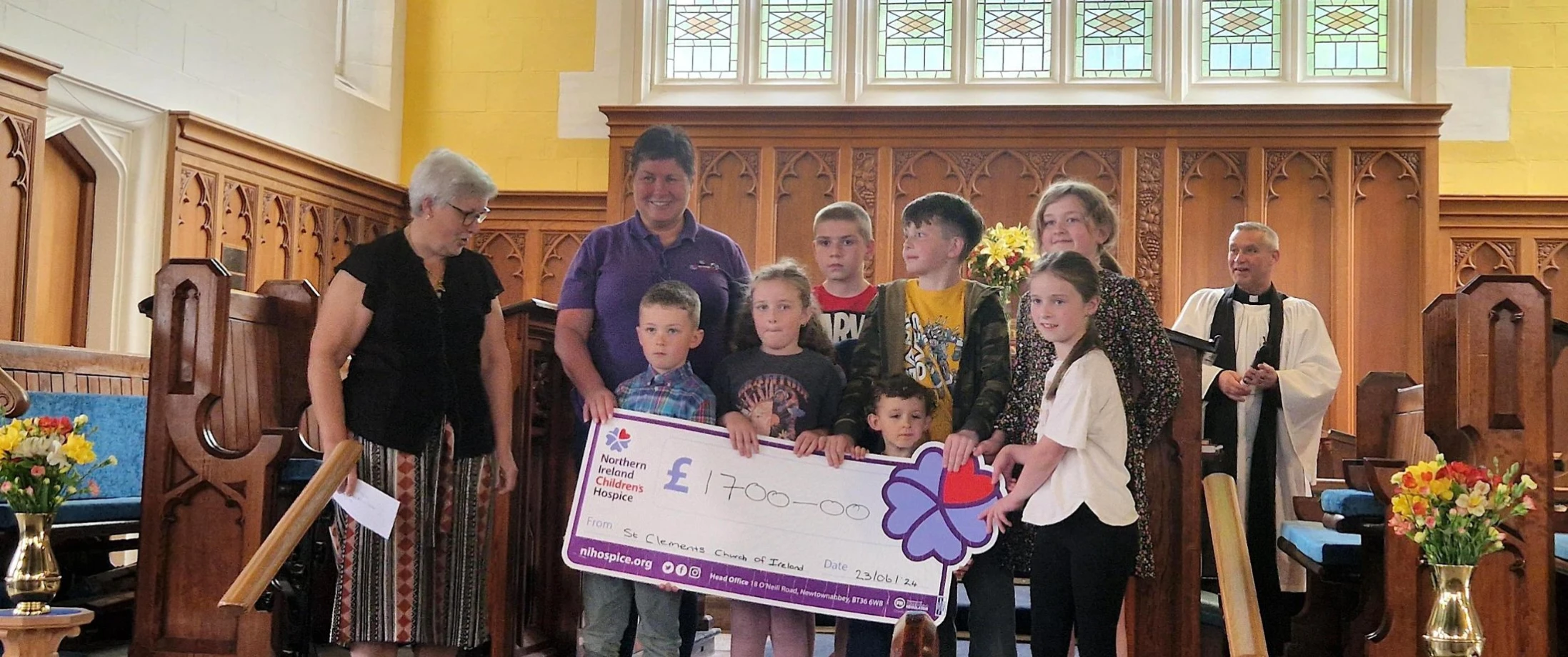 St Clement's present cheque to Children's Hospice