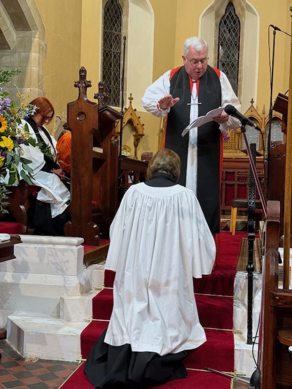 Praying over the new rector