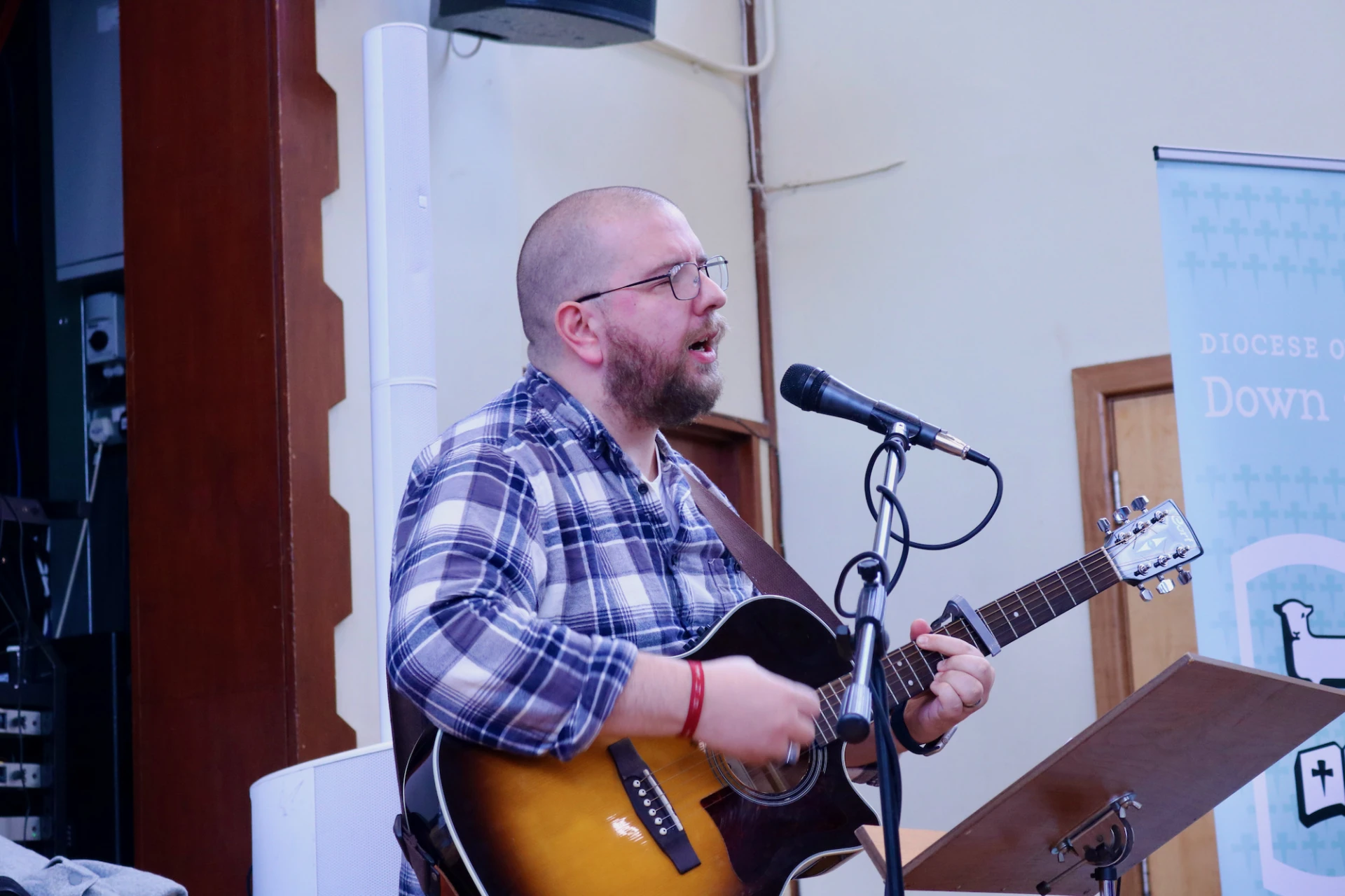 Raymond McClure leads worship