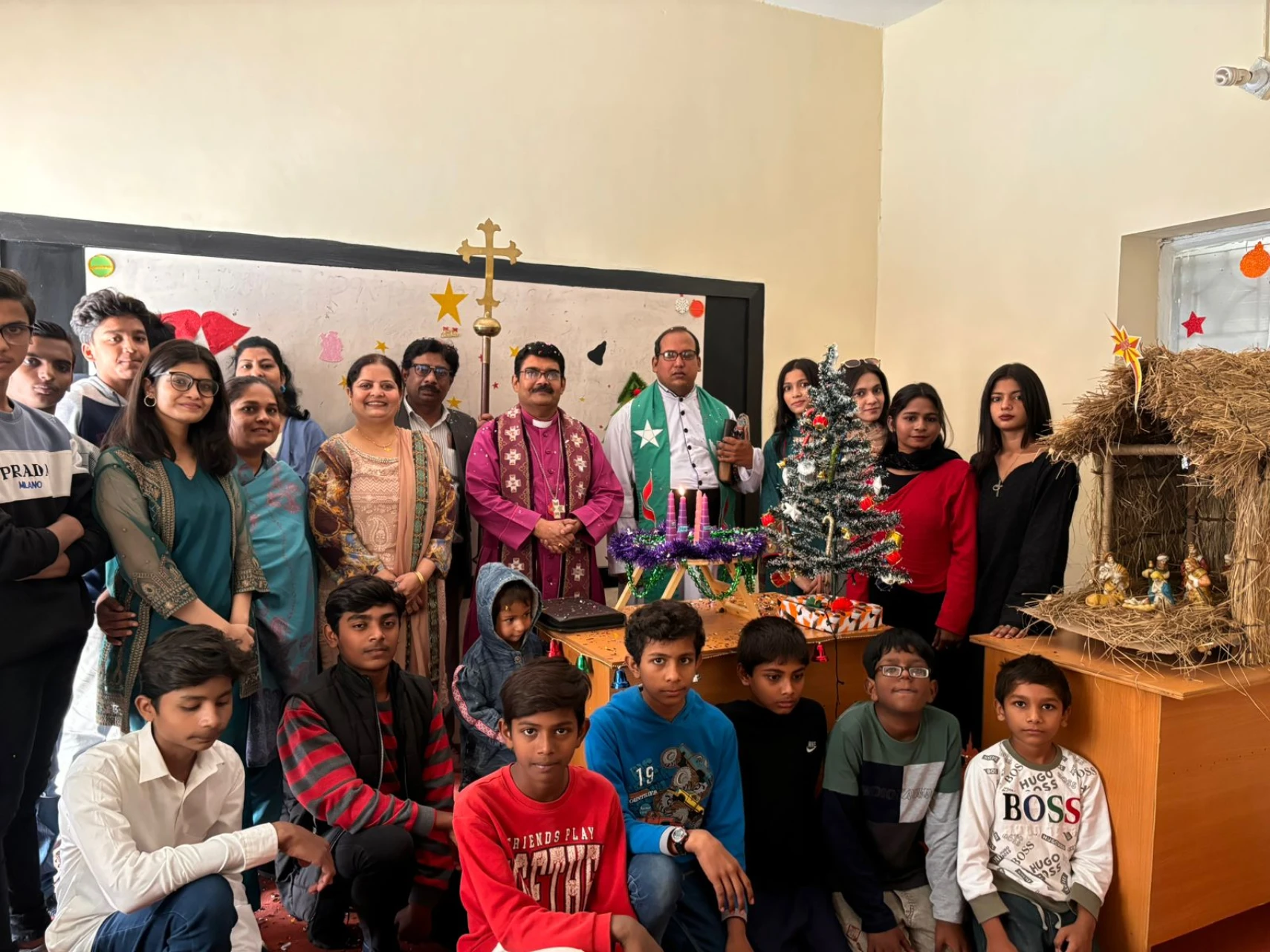 Young Bible School students with the Advent wreath